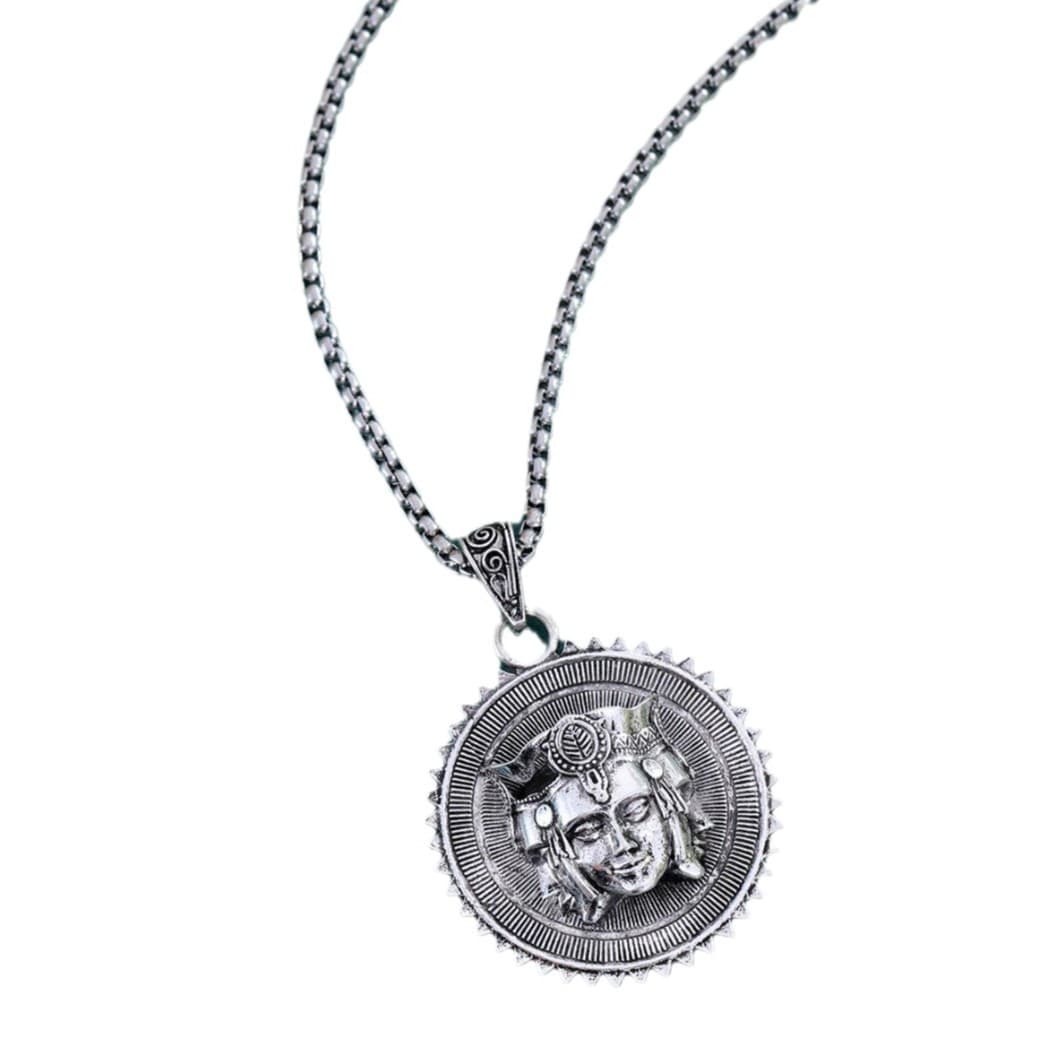 シルバーアクセサリー 神秘の円盤 仏面彫刻ネックレス
