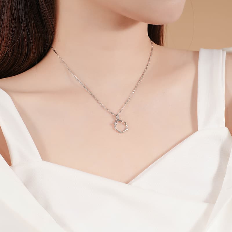シルバーアクセサリー 葉巻きリースのペンダント